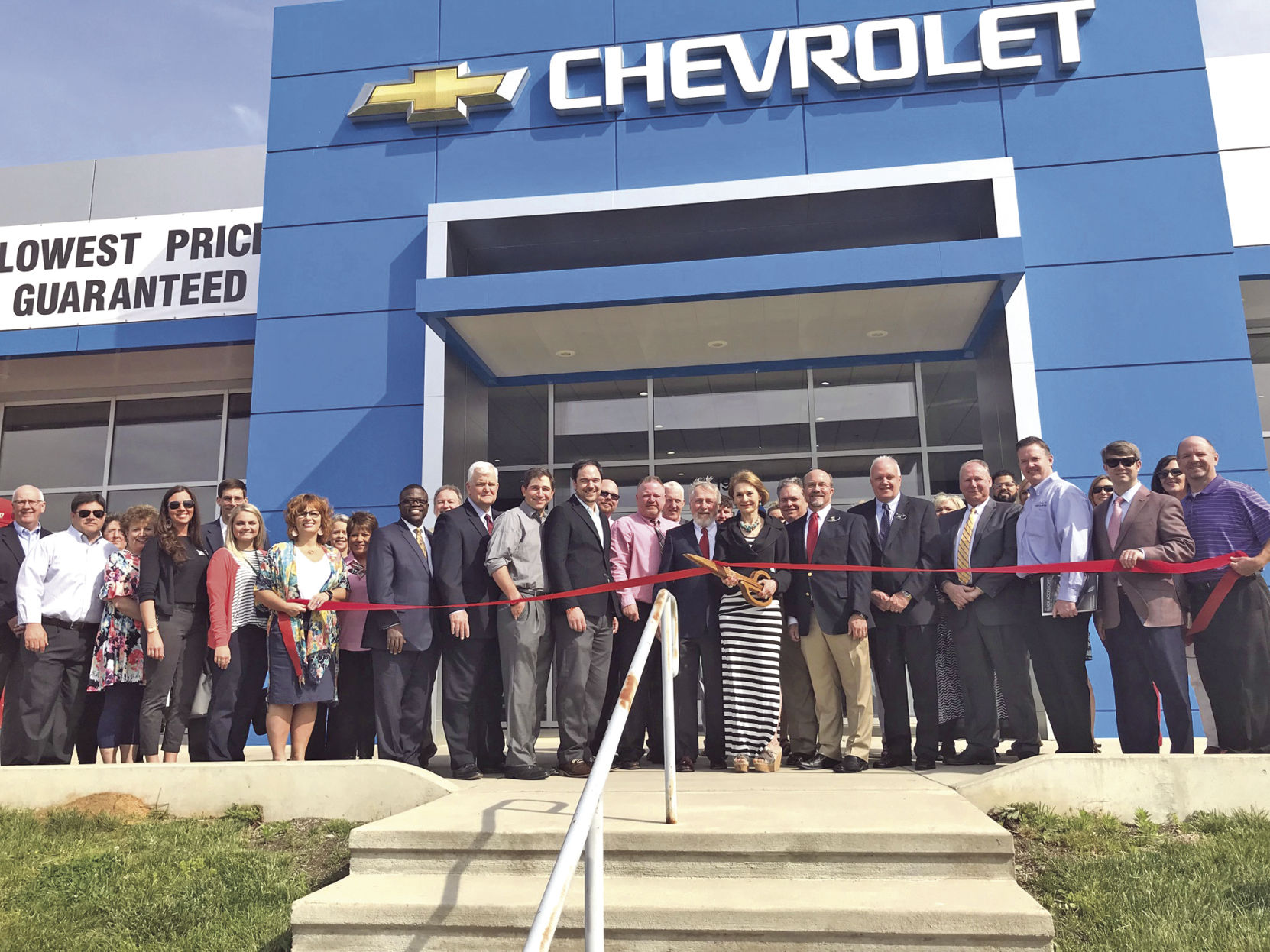 Long of Athens holds ribbon cutting